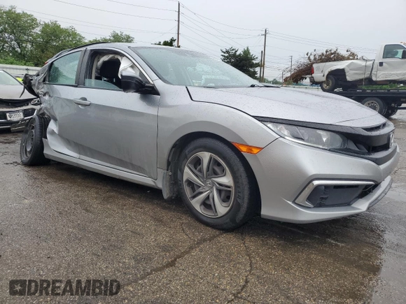 2020 Honda Civic LX with VIN 19XFC2F63LE026869, listed as a Copart auction lot 58776935 with 60,507 mi miles and Salvage title. Bid and sale history available at DreamBid. Image 4.
