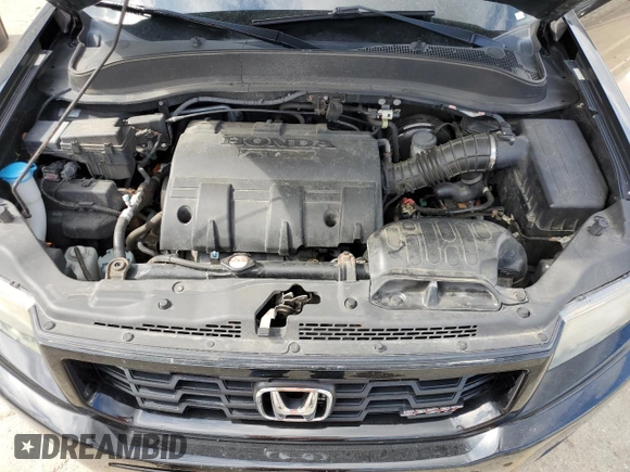 2013 Honda Ridgeline Sport z VIN 5FPYK1F77DB008344, wystawiony jako Copart lot #58704035 z przebiegiem 108 048 mil mil oraz Szkoda całkowita • Salvage title. Historia ofert i sprzedaży dostępna na DreamBid. Obrazek 11.
