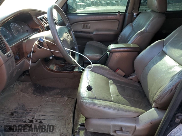 1999 Toyota 4Runner Limited z VIN JT3HN87R3X0219430, wystawiony jako Copart lot #46487885 z przebiegiem 453 337 mil mil oraz Szkoda całkowita • Salvage title. Historia ofert i sprzedaży dostępna na DreamBid. Obrazek 7.