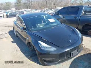 2020 Tesla Model 3 Standard Range Plus with VIN 5YJ3E1EA0LF660759, listed as a IAAI auction lot 41505250 with 63,322 mi miles and . Bid and sale history available at DreamBid. Image 1.