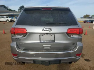 2016 Jeep Grand Cherokee Overland with VIN 1C4RJFCT2GC320247, listed as a Copart auction lot 50832195 with 104,300 mi miles and Salvage title. Bid and sale history available at DreamBid. Image 6.