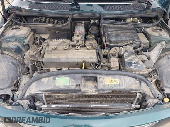 2006 MINI Hardtop with VIN WMWRC33566TK67977, listed as a IAAI auction lot 42538539 with 121,650 mi miles and . Bid and sale history available at DreamBid. Image 10.