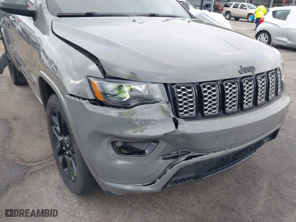 2021 Jeep Grand Cherokee Laredo X with VIN 1C4RJEAG4MC597302, listed as a IAAI auction lot 41919123 with 63,849 mi miles. Bid and sale history available at carsss.com. Image 17.