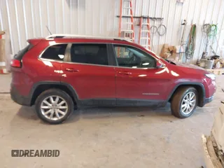 2014 Jeep Cherokee Limited z VIN 1C4PJMDB5EW237604, wystawiony jako IAAI lot #41694117 z przebiegiem 95 959 mil mil oraz . Historia ofert i sprzedaży dostępna na DreamBid. Obrazek 13.