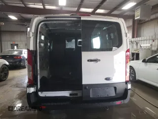 2024 Ford Transit Cargo with VIN 1FTBR1Y82RKA40676, listed as a Copart auction lot 73246064 with 1,430 mi miles and Clean Title. Bid and sale history available at DreamBid. Image 6.