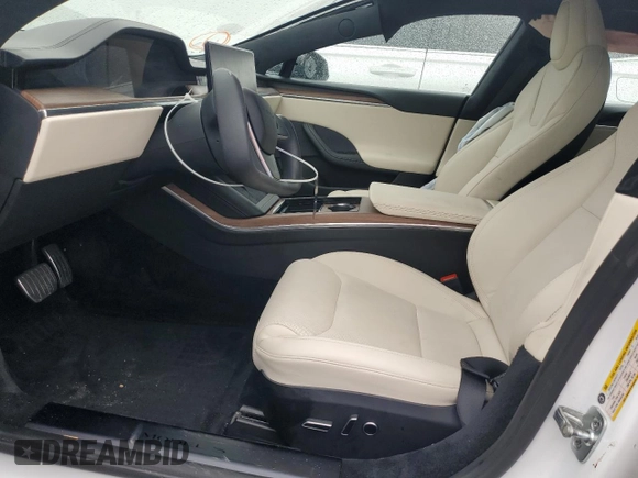 2021 Tesla Model S Long Range z VIN 5YJSA1E5XMF439827, wystawiony jako Copart lot #56117755 z przebiegiem Nie podano mil oraz Szkoda całkowita • Salvage title. Historia ofert i sprzedaży dostępna na DreamBid. Obrazek 7.