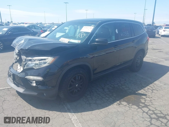 2016 Honda Pilot EX-L with VIN 5FNYF5H5XGB029595, listed as a IAAI auction lot 41561758 with 172,725 mi miles and . Bid and sale history available at DreamBid. Image 2.