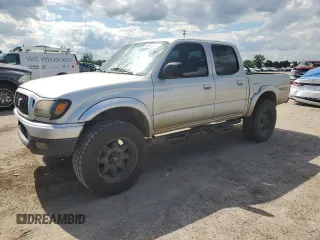 2001 Toyota Tacoma PreRunner z VIN 5TEGN92N61Z771593, wystawiony jako Copart lot #56904345 z przebiegiem 295 679 mil mil oraz Szkody całkowita. Historia ofert i sprzedaży dostępna na DreamBid. Obrazek 1.