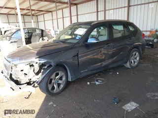 2013 BMW X1 28i with VIN WBAVM1C53DVW43228, listed as a IAAI auction lot 41301776 with 61,323 mi miles. Bid and sale history available at carsss.com. Image 17.