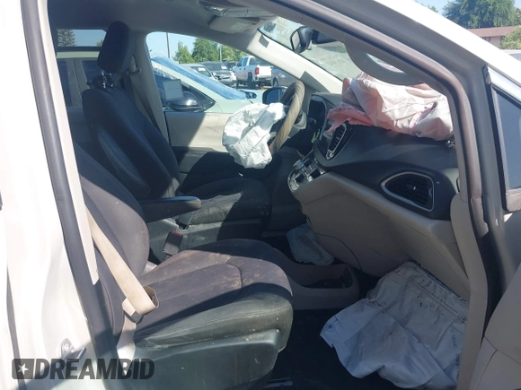 2017 Chrysler Pacifica Touring with VIN 2C4RC1DG6HR633826, listed as a IAAI auction lot 42170041 with 143,481 mi miles and . Bid and sale history available at DreamBid. Image 5.