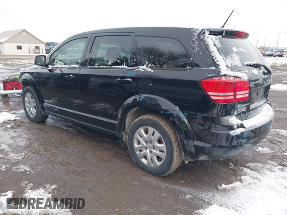 2014 Dodge Journey American Value Pkg with VIN 3C4PDCAB4ET283985, listed as a IAAI auction lot 41617089 with 155,860 mi miles. Bid and sale history available at carsss.com. Image 3.