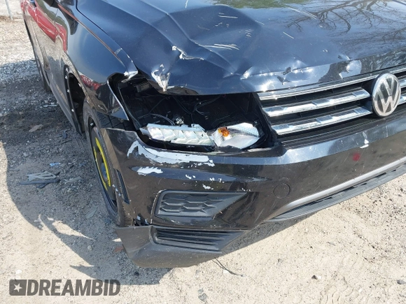 2020 Volkswagen Tiguan S z VIN 3VV1B7AX7LM058984, wystawiony jako IAAI lot #42045211 z przebiegiem 77 293 mil mil oraz . Historia ofert i sprzedaży dostępna na DreamBid. Obrazek 6.