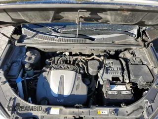 2013 Kia Sorento SX z VIN 5XYKWDA24DG385142, wystawiony jako Copart lot #75187514 z przebiegiem 119 027 mil mil oraz Szkoda całkowita • Salvage title. Historia ofert i sprzedaży dostępna na DreamBid. Obrazek 14.
