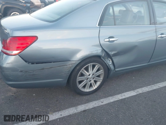 2010 Toyota Avalon XL with VIN 4T1BK3DB1AU363817, listed as a IAAI auction lot 41010053 with 259,106 mi miles and . Bid and sale history available at carsss.com. Image 18.