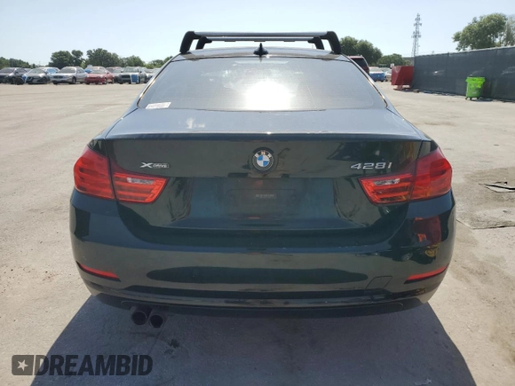 2014 BMW 4 Series 428i xDrive z VIN WBA3N9C5XEF720255, wystawiony jako Copart lot #57125265 z przebiegiem 139 045 mil mil oraz Czysty tytuł • Clean title. Historia ofert i sprzedaży dostępna na DreamBid. Obrazek 6.