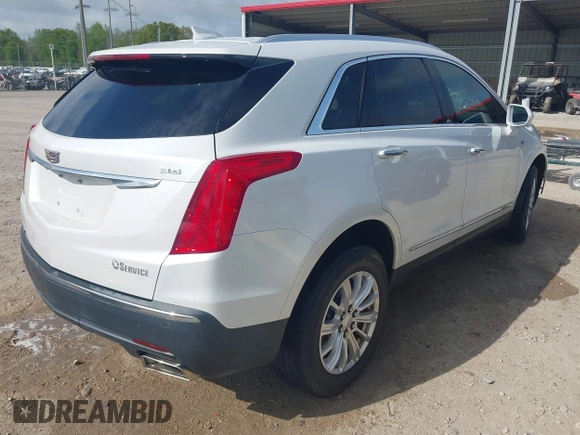 2017 Cadillac XT5 FWD with VIN 1GYKNARS0HZ107734, listed as a IAAI auction lot 41882031 with 89,397 mi miles. Bid and sale history available at carsss.com. Image 4.