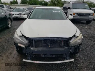 2015 Infiniti Q50 Premium z VIN JN1BV7AR9FM396109, wystawiony jako Copart lot #58215035 z przebiegiem 134 482 mil mil oraz Szkody całkowita. Historia ofert i sprzedaży dostępna na DreamBid. Obrazek 5.