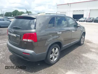 2013 Kia Sorento EX with VIN 5XYKU3A69DG318488, listed as a IAAI auction lot 42618875 with 221,080 mi miles and . Bid and sale history available at DreamBid. Image 4.