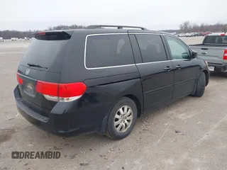 2010 Honda Odyssey EX-L with VIN 5FNRL3H73AB078714, listed as a IAAI auction lot 41520151 with 218,466 mi miles and . Bid and sale history available at DreamBid. Image 4.