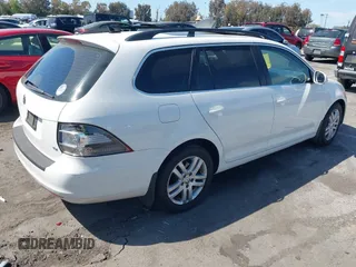 2012 Volkswagen Jetta SportWagen TDI w/Sunroof with VIN 3VWPL7AJ6CM651492, listed as a IAAI auction lot 41980541 with 229,239 mi miles. Bid and sale history available at carsss.com. Image 4.