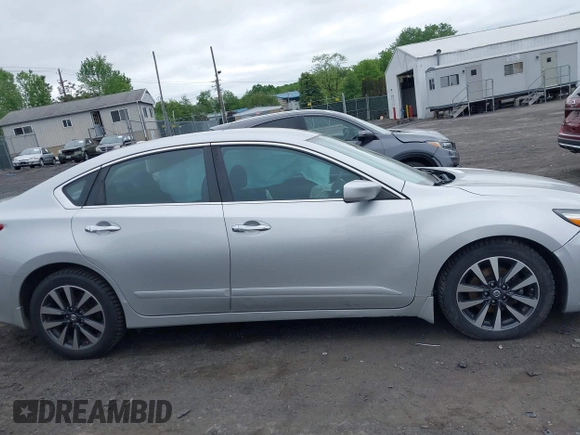 2017 Nissan Altima S z VIN 1N4AL3AP2HC239414, wystawiony jako IAAI lot #42300339 z przebiegiem 98 643 mil mil oraz . Historia ofert i sprzedaży dostępna na DreamBid. Obrazek 13.