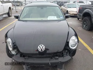 2017 Volkswagen Beetle 1.8T SE with VIN 3VWJ17AT9HM618202, listed as a IAAI auction lot 41562078 with 101,808 mi miles. Bid and sale history available at carsss.com. Image 6.