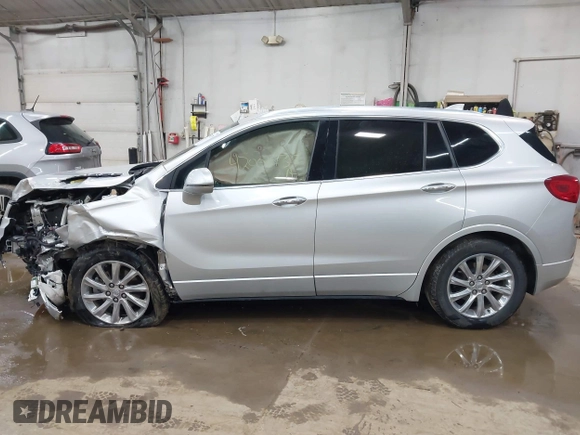 2019 Buick Envision Essence with VIN LRBFXCSA3KD119247, listed as a IAAI auction lot 42001735 with 51,566 mi miles and . Bid and sale history available at carsss.com. Image 14.