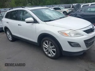 2012 Mazda CX-9 Grand Touring with VIN JM3TB3DA1C0356335, listed as a IAAI auction lot 42658284 with 141,537 mi miles and . Bid and sale history available at DreamBid. Image 1.