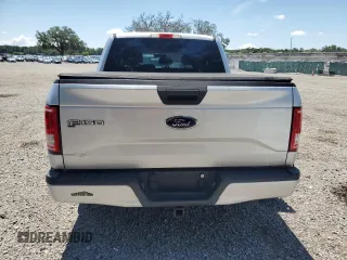 2016 Ford F-150 XL with VIN 1FTEW1CP0GKF41082, listed as a Copart auction lot 62001965 with 205,027 mi miles and Salvage title. Bid and sale history available at DreamBid. Image 6.