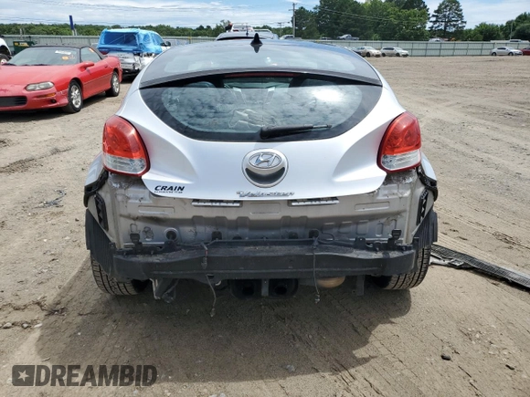 2013 Hyundai Veloster w/Gray Int z VIN KMHTC6AD3DU135296, wystawiony jako Copart lot #59778985 z przebiegiem 125 134 mil mil oraz Czysty tytuł • Clean title. Historia ofert i sprzedaży dostępna na DreamBid. Obrazek 6.