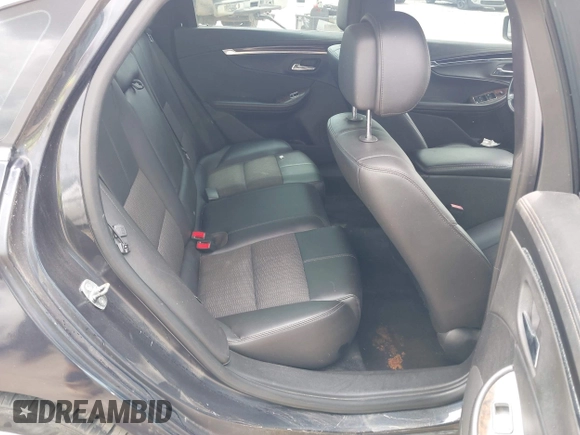2014 Chevrolet Impala LT with VIN 2G1115SLXE9222573, listed as a IAAI auction lot 42119082 with 147,011 mi miles and . Bid and sale history available at DreamBid. Image 8.