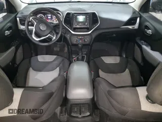 2014 Jeep Cherokee Sport with VIN 1C4PJLAB0EW320792, listed as a Copart auction lot 42204355 with 183,107 mi miles and Salvage Title. Bid and sale history available at DreamBid. Image 8.
