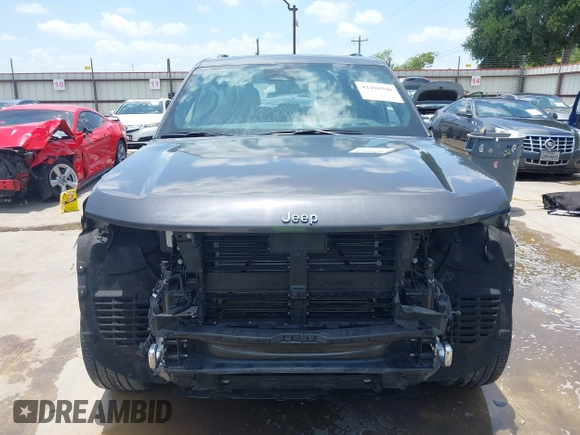 2022 Jeep Grand Cherokee Overland with VIN 1C4RJHDG6N8580874, listed as a IAAI auction lot 42498940 with 19,818 mi miles and . Bid and sale history available at DreamBid. Image 13.