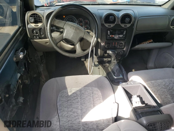 2004 GMC Envoy SLE with VIN 1GKDS13S842402250, listed as a Copart auction lot 54941005 with 163,380 mi miles and Salvage Title. Bid and sale history available at DreamBid. Image 8.