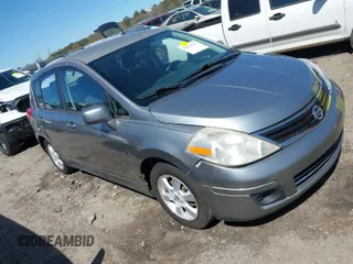 2012 Nissan Versa S with VIN 3N1BC1CP0CK206613, listed as a IAAI auction lot 41836647 with 180,698 mi miles. Bid and sale history available at carsss.com. Image 1.
