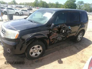 2015 Honda Pilot SE with VIN 5FNYF4H38FB071223, listed as a IAAI auction lot 42013352 with 196,617 mi miles and . Bid and sale history available at DreamBid. Image 17.
