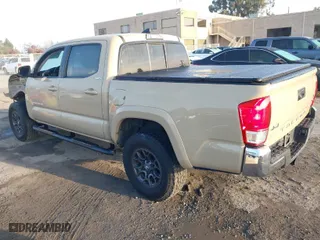 2017 Toyota Tacoma SR5 with VIN 3TMCZ5AN9HM085388, listed as a IAAI auction lot 41118155 with 113,998 mi miles. Bid and sale history available at carsss.com. Image 3.