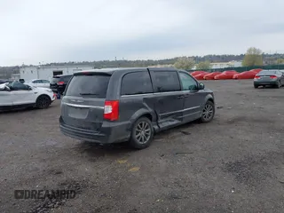 2015 Chrysler Town & Country S with VIN 2C4RC1HG7FR522449, listed as a IAAI auction lot 42021311 with 107,391 mi miles. Bid and sale history available at carsss.com. Image 4.