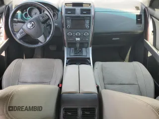 2015 Mazda CX-9 Grand Touring with VIN JM3TB3DA7F0454094, listed as a Copart auction lot 61757035 with 56,997 mi miles and Salvage title. Bid and sale history available at DreamBid. Image 8.