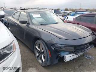 2017 Dodge Charger SE with VIN 2C3CDXBG8HH660321, listed as a IAAI auction lot 37875402 with 82,772 mi miles. Bid and sale history available at carsss.com. Image 1.