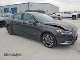 2017 Ford Fusion Hybrid Titanium with VIN 3FA6P0RU7HR388521, listed as a Copart auction lot 57318895 with 117,720 mi miles and Salvage title. Bid and sale history available at DreamBid. Image 4.