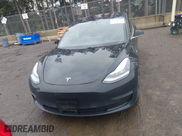 2019 Tesla Model 3 Mid Range with VIN 5YJ3E1EAXKF296378, listed as a IAAI auction lot 41739616 with 77,100 mi miles and . Bid and sale history available at DreamBid. Image 11.