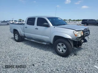 2010 Toyota Tacoma PreRunner with VIN 3TMKU4HN1AM025931, listed as a Copart auction lot 54336905 with 184,868 mi miles and Salvage title. Bid and sale history available at DreamBid. Image 4.
