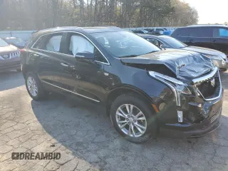 2020 Cadillac XT5 Luxury FWD with VIN 1GYKNAR43LZ167680, listed as a Copart auction lot 50603835 with 52,874 mi miles and Salvage title. Bid and sale history available at DreamBid. Image 4.