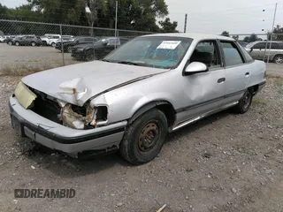 1987 Mercury Sable z VIN 1MEBM50U0HG659744, wystawiony jako IAAI lot #38575150 z przebiegiem 48 130 mil mil oraz . Historia ofert i sprzedaży dostępna na DreamBid. Obrazek 2.