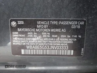 2018 BMW 3 Series 320i xDrive with VIN WBA8E5G53JNV03333, listed as a IAAI auction lot 42018275 with 45,950 mi miles. Bid and sale history available at carsss.com. Image 9.