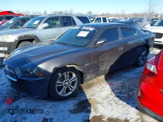 2013 Dodge Charger RT Plus with VIN 2C3CDXDT7DH558898, listed as a IAAI auction lot 41364210 with 144,351 mi miles. Bid and sale history available at carsss.com. Image 2.