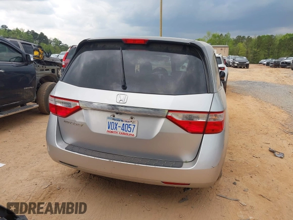 2013 Honda Odyssey LX with VIN 5FNRL5H27DB075559, listed as a IAAI auction lot 42007141 with Not Provided miles and . Bid and sale history available at carsss.com. Image 15.