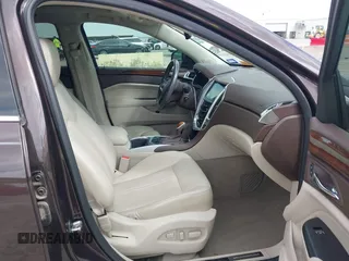2015 Cadillac SRX Luxury Collection z VIN 3GYFNBE35FS597538, wystawiony jako IAAI lot #42056002 z przebiegiem 49 483 mil mil oraz . Historia ofert i sprzedaży dostępna na DreamBid. Obrazek 5.