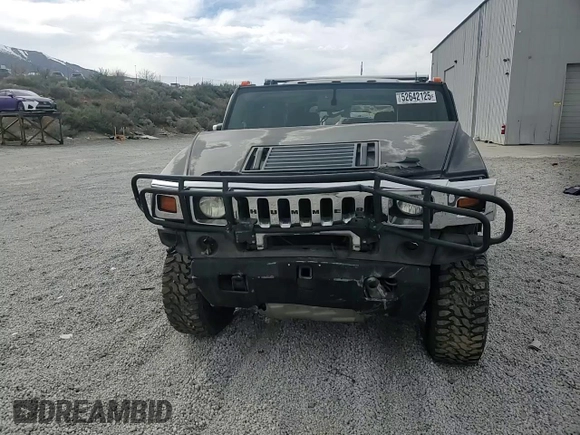 2004 Hummer H2 z VIN 5GRGN23U74H100175, wystawiony jako Copart lot #52642125 z przebiegiem 112 305 mil mil oraz Szkoda całkowita • Salvage title. Historia ofert i sprzedaży dostępna na DreamBid. Obrazek 12.